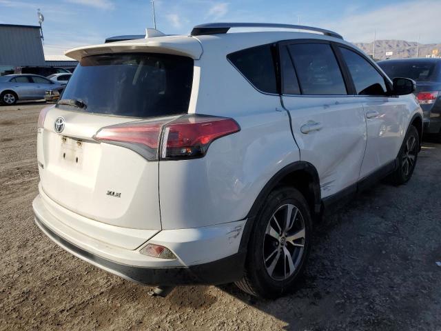 Photo 3 from auction – 2016 TOYOTA RAV4 XLE with VIN JTMWFREV2GD090644