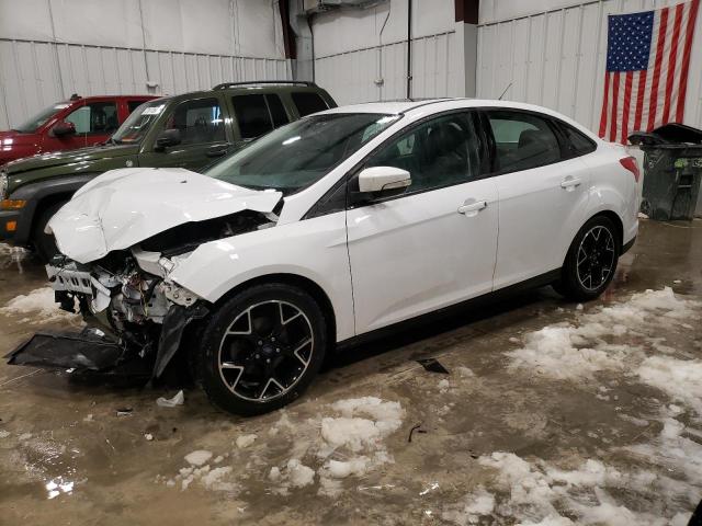 FORD FOCUS SE 2014 with VIN 1FADP3F27EL240858 - Photo from auction