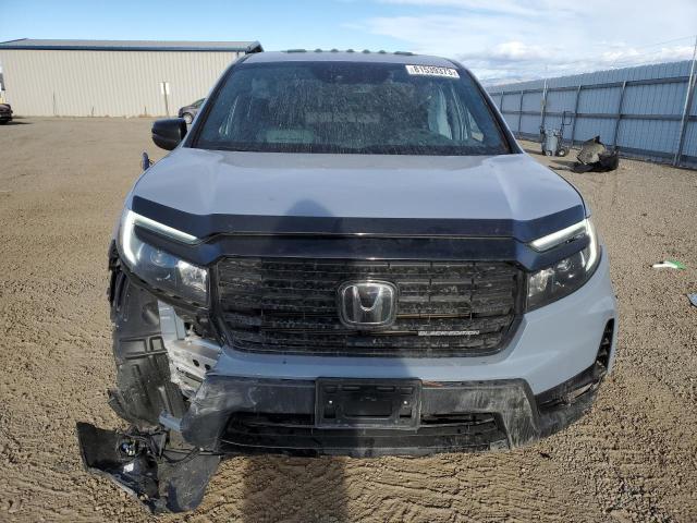 Photo 5 from auction – 2023 HONDA RIDGELINE with VIN 5FPYK3F83PB004638