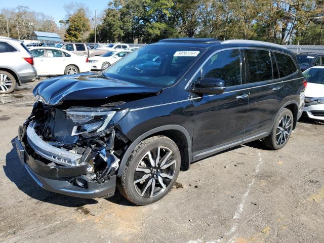 HONDA PILOT TOUR 2019 with VIN 5FNYF5H62KB034341 - Photo from auction