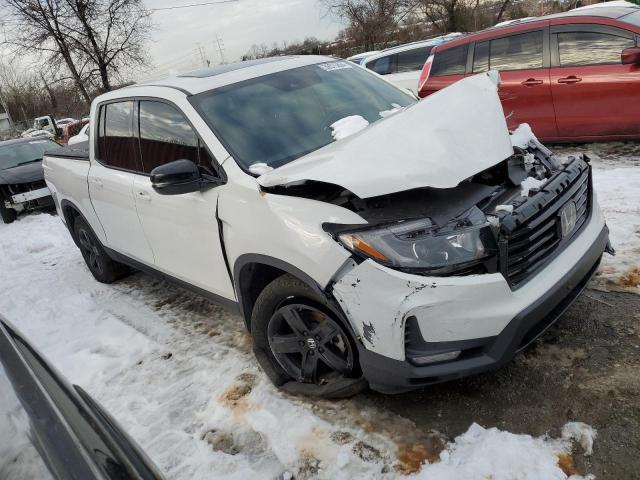 Photo 4 from auction – 2022 HONDA RIDGELINE with VIN 5FPYK3F84NB013233