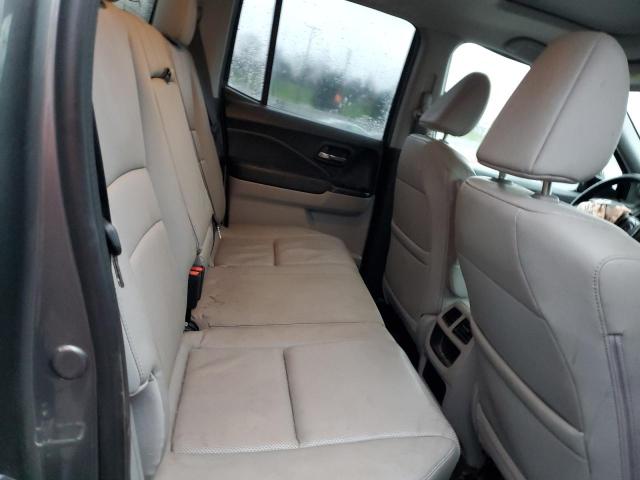Photo 11 from auction – 2018 HONDA RIDGELINE with VIN 5FPYK3F77JB013373