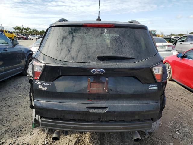 Photo 6 from auction – 2018 FORD ESCAPE SEL with VIN 1FMCU0HD4JUC73280