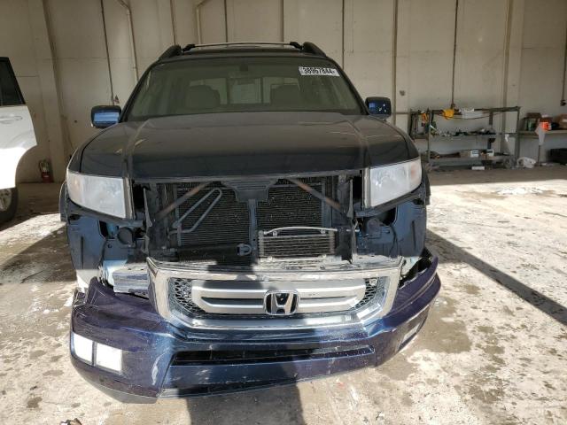 Photo 5 from auction – 2010 HONDA RIDGELINE with VIN 5FPYK1F51AB007118