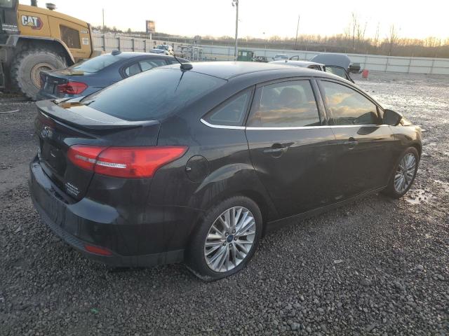 Photo 3 from auction – 2015 FORD FOCUS TITA with VIN 1FADP3J23FL227209