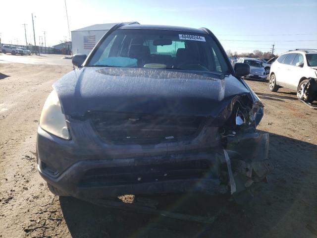 Photo 5 from auction – 2004 HONDA CR-V LX with VIN JHLRD68404C014123