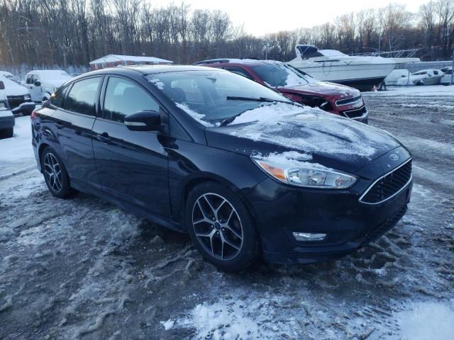 Photo 4 from auction – 2016 FORD FOCUS SE with VIN 1FADP3F28GL385913