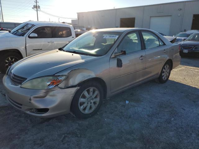 TOYOTA CAMRY LE 2004 with VIN 4T1BE30KX4U285152 - Photo from auction