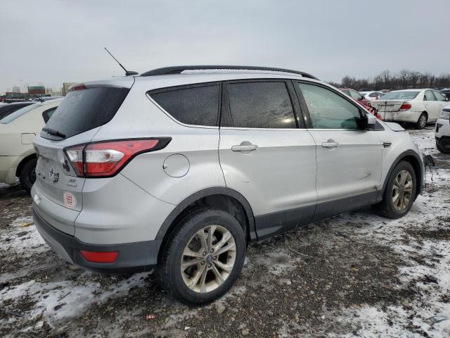 Photo 3 from auction – 2018 FORD ESCAPE with VIN 1FMCU0GD1JUB15464