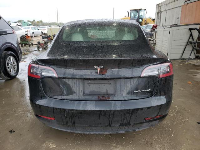 Photo 6 from auction – 2022 TESLA MODEL 3 with VIN 5YJ3E1EB8NF233504