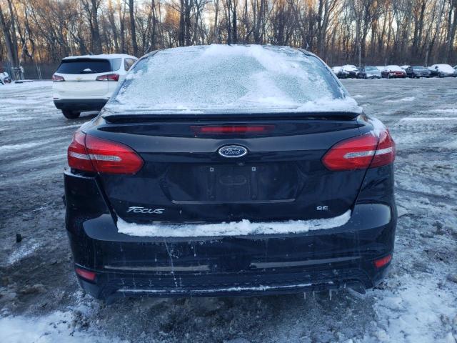 Photo 6 from auction – 2016 FORD FOCUS SE with VIN 1FADP3F28GL385913