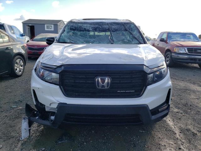 Photo 5 from auction – 2023 HONDA RIDGELINE with VIN 5FPYK3F80PB001356