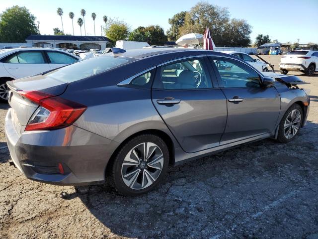 Photo 3 from auction – 2017 HONDA CIVIC EX with VIN 2HGFC1F33HH653178