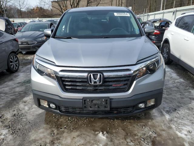 Photo 5 from auction – 2019 HONDA RIDGELINE with VIN 5FPYK3F13KB007096