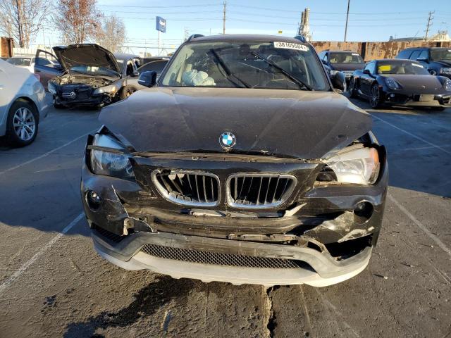 Photo 5 from auction – 2015 BMW X1 SDRIVE2 with VIN WBAVM1C52FVW58564