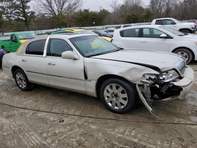 Photo 4 from auction – 2004 LINCOLN TOWN CAR U with VIN 1LNHM83W24Y677950