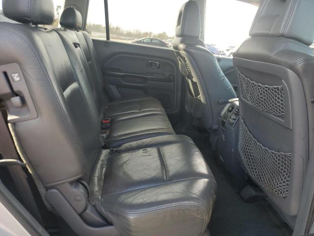 Photo 11 from auction – 2004 HONDA PILOT with VIN 2HKYF18604H593061