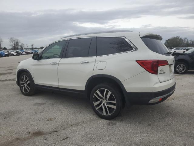 Photo 2 from auction – 2017 HONDA PILOT ELIT with VIN 5FNYF6H01HB052050