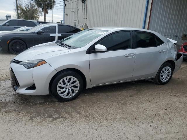 TOYOTA COROLLA L 2019 with VIN 5YFBURHE5KP876380 - Photo from auction