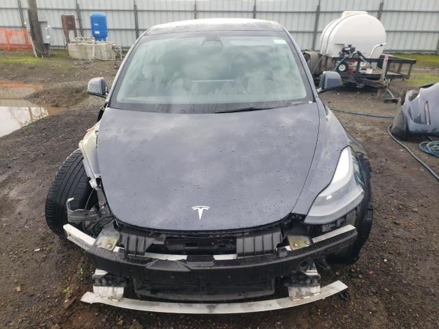 Photo 5 from auction – 2022 TESLA MODEL 3 with VIN 5YJ3E1EB2NF145743