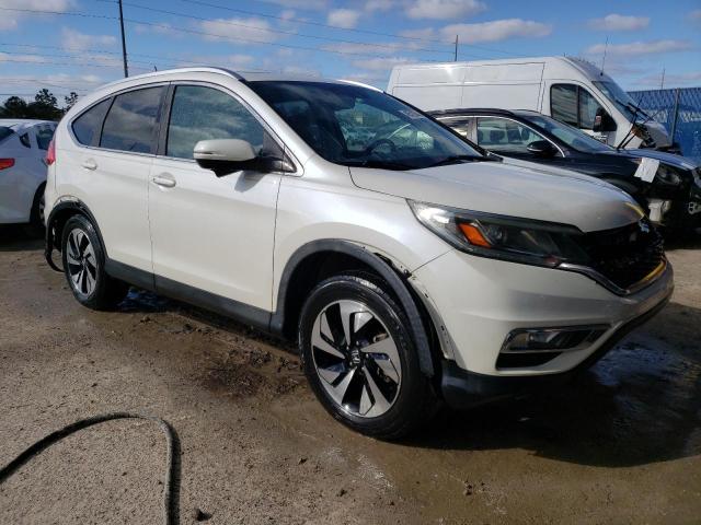 Photo 4 from auction – 2015 HONDA CR-V TOURI with VIN 5J6RM4H99FL067414