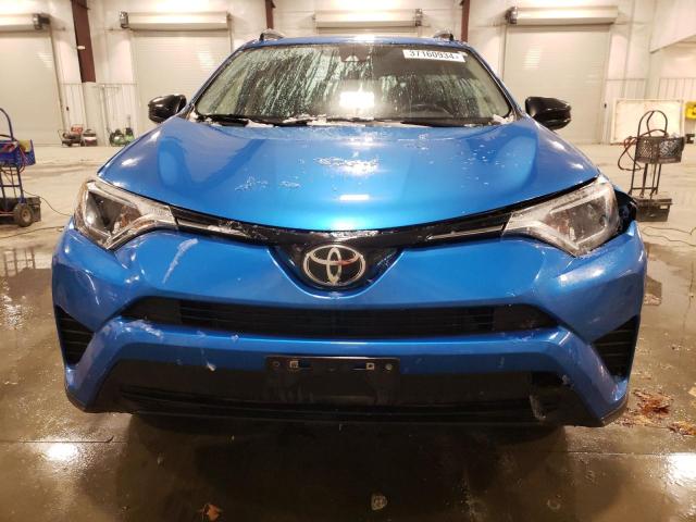 Photo 5 from auction – 2017 TOYOTA RAV4 LE with VIN JTMBFREV6HJ707500