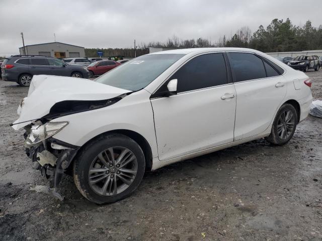 TOYOTA CAMRY LE 2017 with VIN 4T1BF1FKXHU696596 - Photo from auction