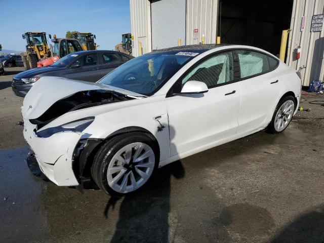 TESLA MODEL 3 2022 with VIN 5YJ3E1EB4NF144187 - Photo from auction