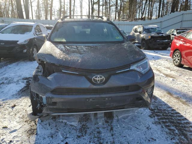 Photo 5 from auction – 2017 TOYOTA RAV4 XLE with VIN JTMRFREV0HJ128372