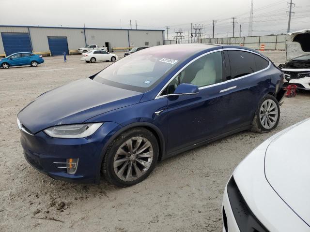TESLA MODEL X 2018 with VIN 5YJXCBE22JF138296 - Photo from auction