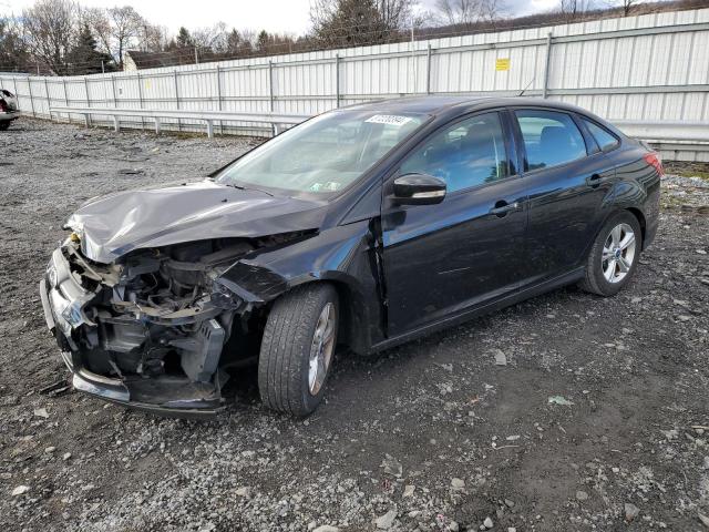 FORD FOCUS SE 2014 with VIN 1FADP3F20EL188652 - Photo from auction