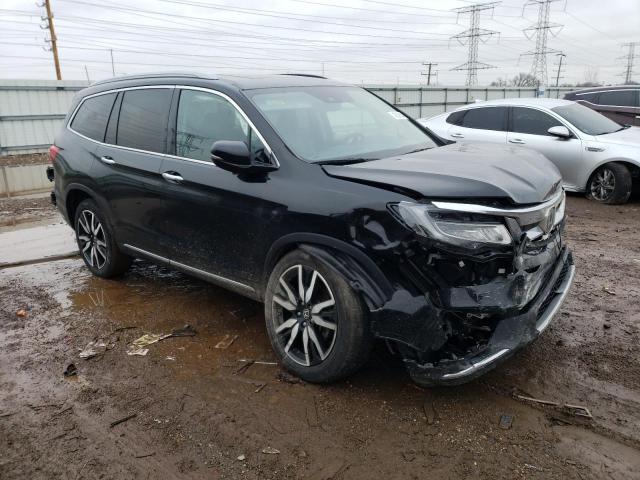 Photo 4 from auction – 2022 HONDA PILOT TOUR with VIN 5FNYF6H97NB000657
