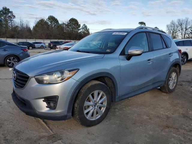 MAZDA CX-5 TOURI 2016 with VIN JM3KE2CY3G0661191 - Photo from auction