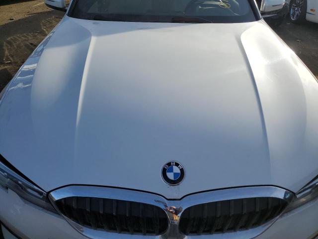Photo 11 from auction – 2022 BMW 330XI with VIN 3MW5R7J03N8C62754