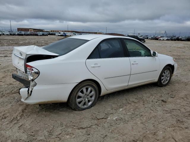Photo 3 from auction – 2002 TOYOTA CAMRY LE with VIN JTDBF30K120003132