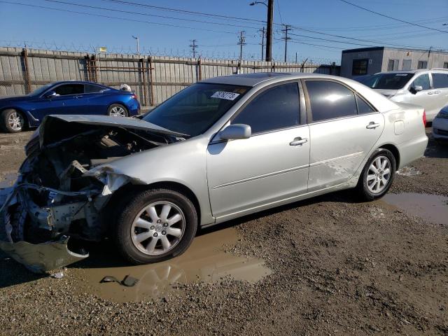 TOYOTA CAMRY LE 2002 with VIN JTDBE30K420073789 - Photo from auction