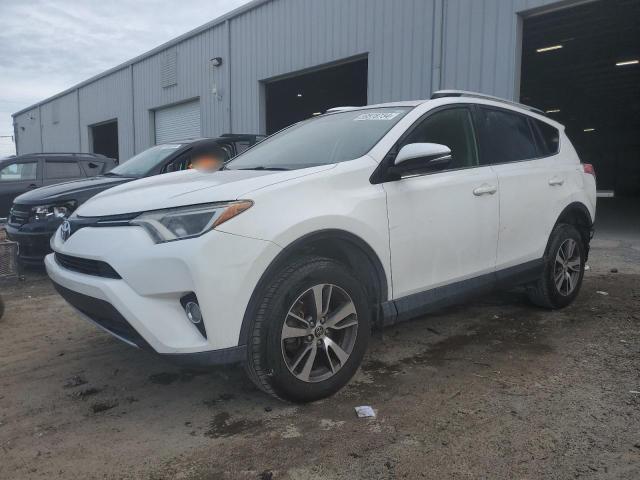 TOYOTA RAV4 XLE 2016 with VIN JTMWFREV8GJ072232 - Photo from auction