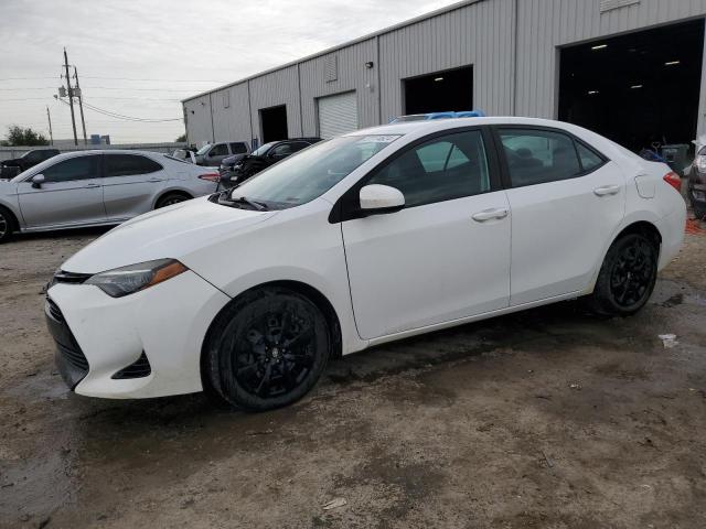 TOYOTA COROLLA L 2018 with VIN 5YFBURHE0JP802671 - Photo from auction