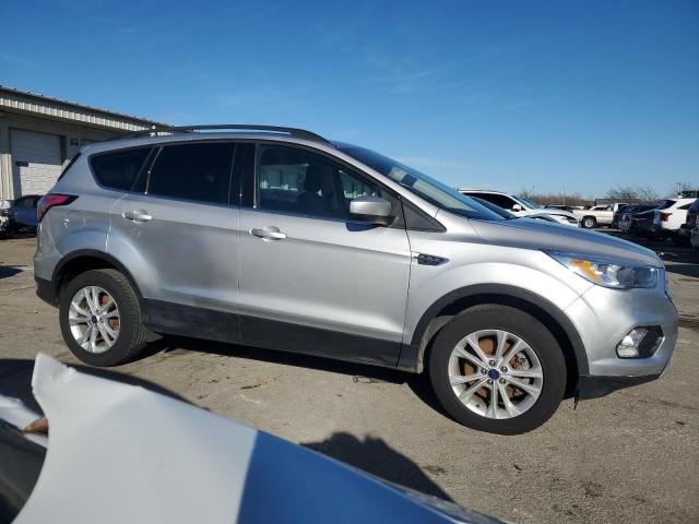 Photo 4 from auction – 2018 FORD ESCAPE SE with VIN 1FMCU9GD5JUC90174