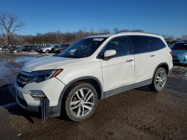 HONDA PILOT ELIT 2017 with VIN 5FNYF6H08HB011799 - Photo from auction