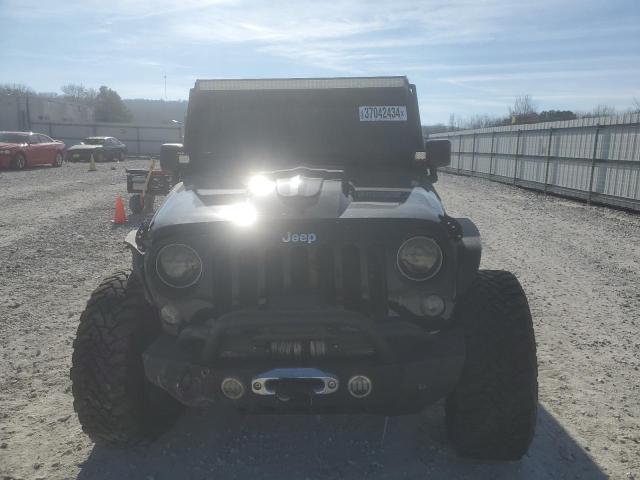 Photo 5 from auction – 2015 JEEP WRANGLER U with VIN 1C4BJWFG0FL560024