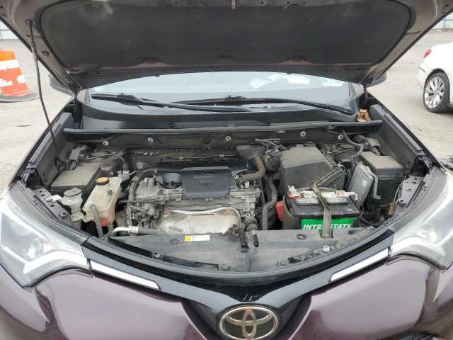 Photo 12 from auction – 2018 TOYOTA RAV4 LE with VIN 2T3BFREV6JW746630
