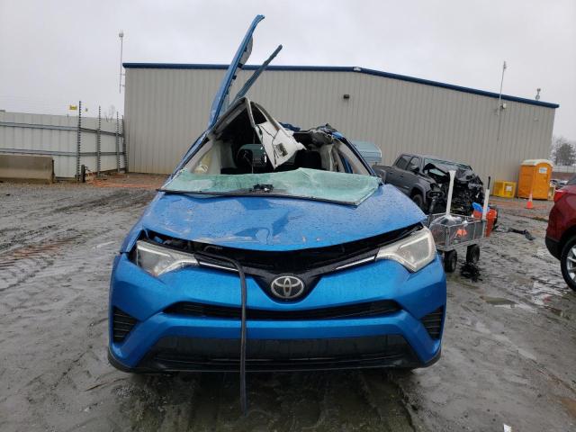 Photo 5 from auction – 2018 TOYOTA RAV4 LE with VIN JTMZFREV2JJ164358