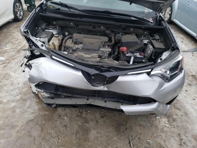 Photo 11 from auction – 2018 TOYOTA RAV4 LE with VIN JTMBFREV0JJ235770