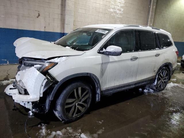 HONDA PILOT TOUR 2016 with VIN 5FNYF5H98GB011650 - Photo from auction
