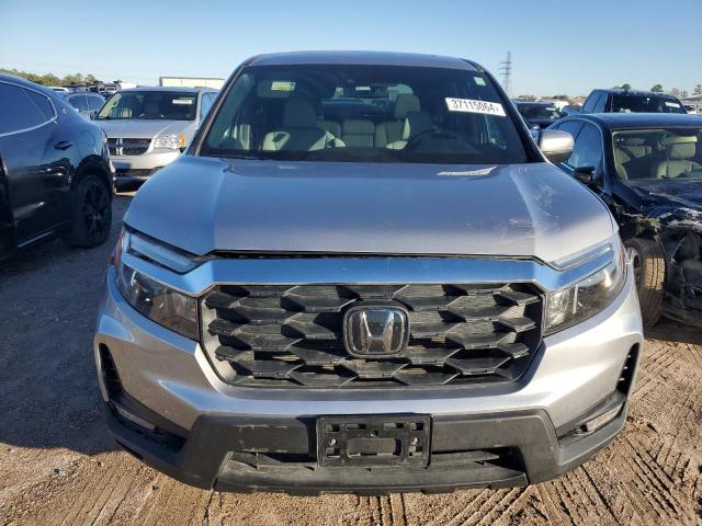 Photo 5 from auction – 2022 HONDA PASSPORT E with VIN 5FNYF8H53NB004035