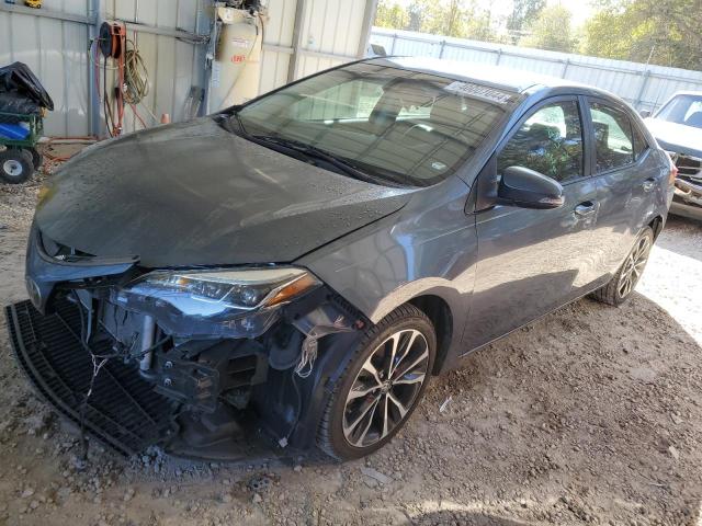 TOYOTA COROLLA L 2017 with VIN 5YFBURHE4HP617484 - Photo from auction