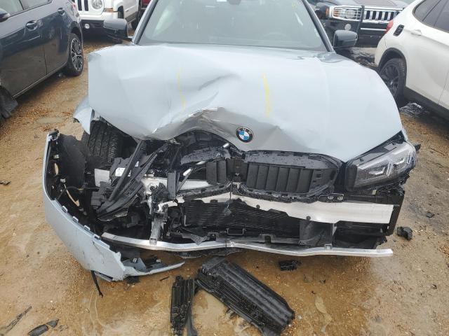 Photo 11 from auction – 2023 BMW 330XI with VIN 3MW89FF06P8D29267