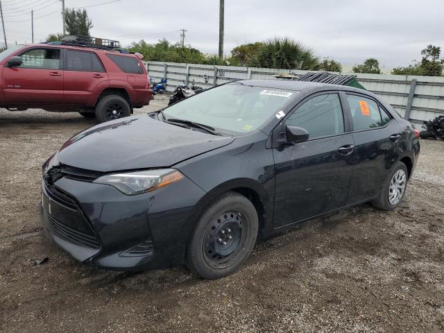 TOYOTA COROLLA L 2019 with VIN 5YFBURHE8KP895344 - Photo from auction