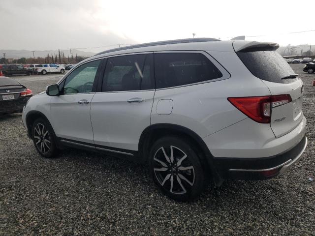 Photo 2 from auction – 2022 HONDA PILOT TOUR with VIN 5FNYF6H69NB086382